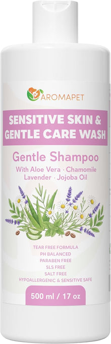 A white bottle of Aromapet Sensitive Skin & Gentle Care Wash Gentle Shampoo, featuring pink and green text and botanical illustrations of lavender and chamomile on the front label.