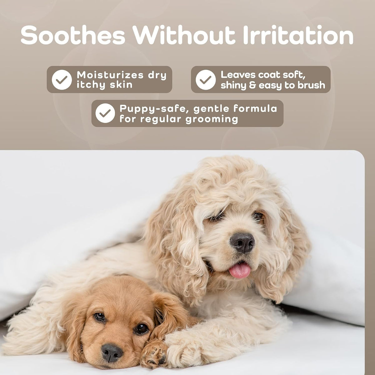 Two fluffy dogs lying together on a white surface under soft lighting, with marketing text at the top reading 'Soothes Without Irritation' and bullet points about moisturizing dry itchy skin, a soft shiny coat, and puppy-safe gentle formula for regular grooming.
