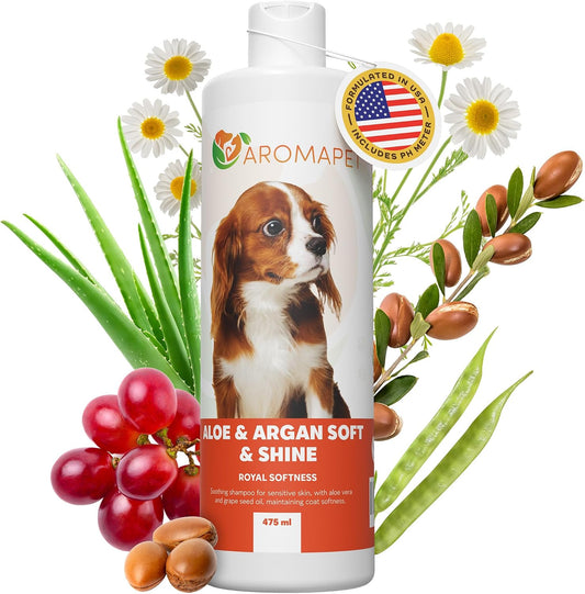 Shampoo bottle for dogs with aloe vera, argan oil, and grapes on a white background