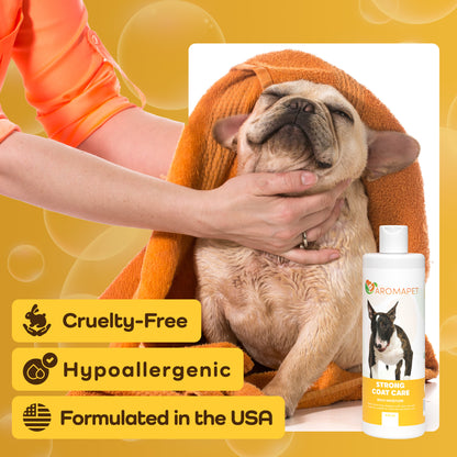 Person holding a dog wrapped in an orange towel with a bottle of Romapet shampoo on a yellow background
