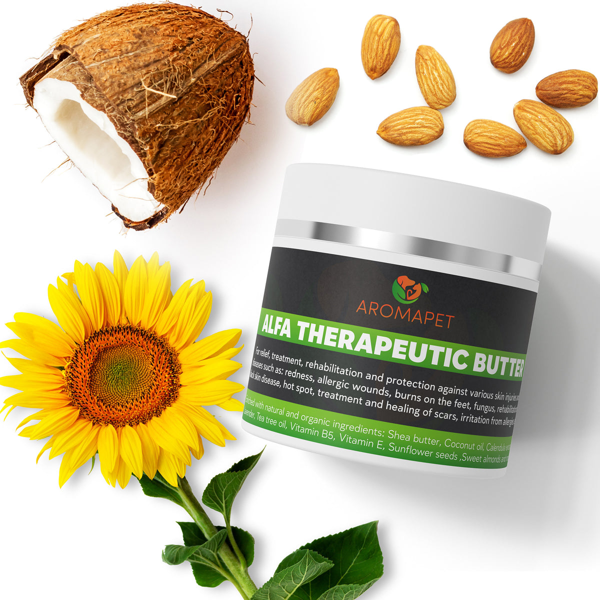 A jar of Aromapet Alfa Therapeutic Butter is displayed on a white background with decorative natural ingredients (a coconut, almonds, and a sunflower) arranged around it.